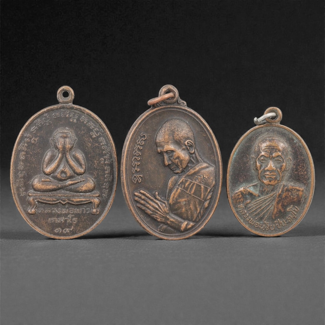 Three Thai Copper Alloy Devotional Amulets, 20th Century, 76FN (1 of 2)