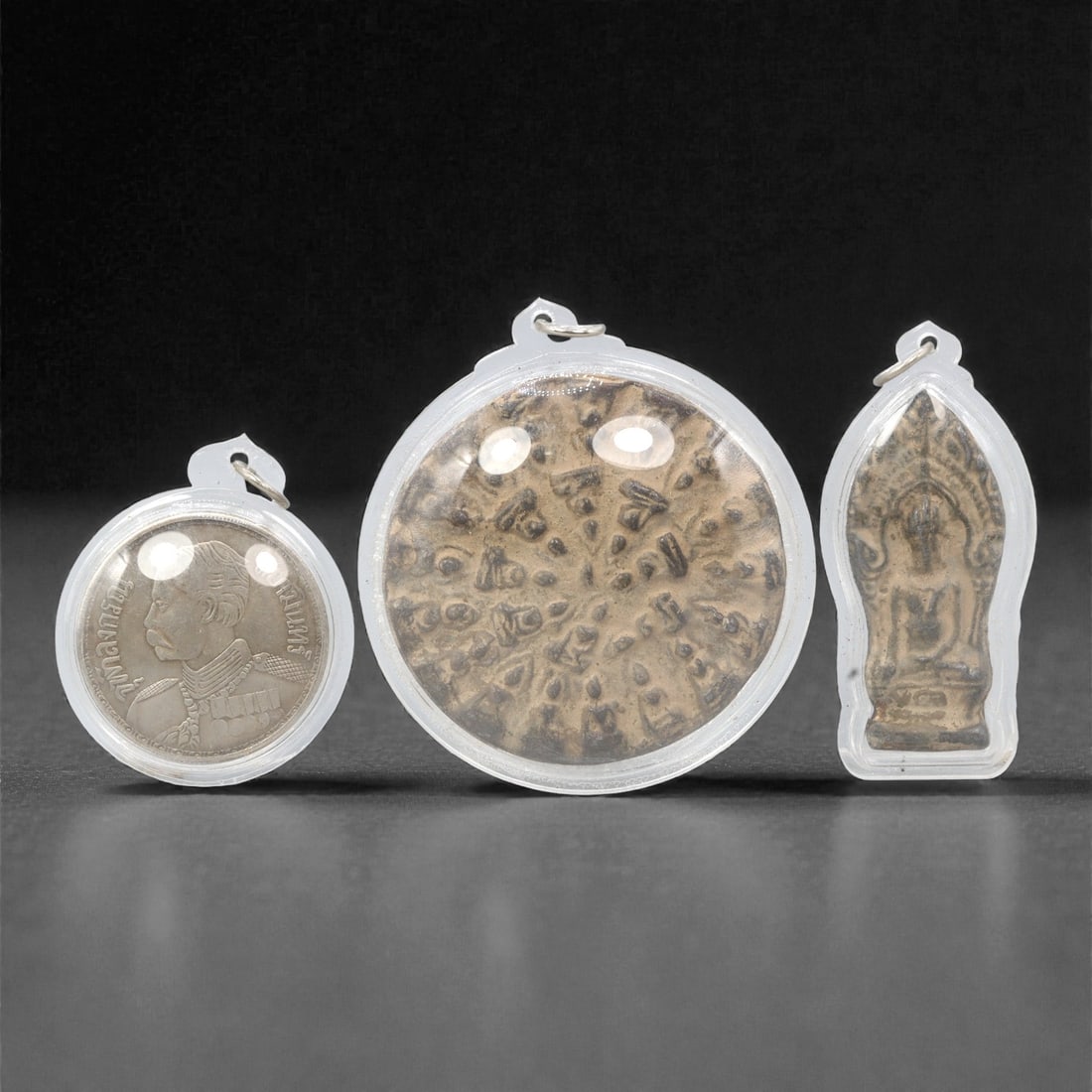 A Group of Thai Clay and Metal Buddhist Amulets and Medallion, 20th Century, 24ZG (1 of 2)