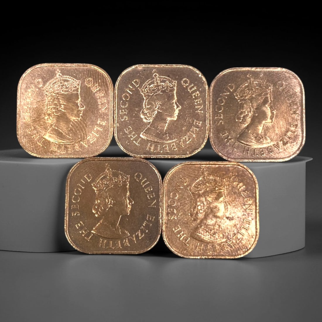 MALAYA AND BRITISH BORNEO: Commonwealth 5-Piece 1 Cent Square Coin Set, 1957-1961, 20mm, 26ZJ: This 5-piece set of square 1 Cent coins from Malaya and British Borneo, minted between 1957 and 1961, captures a pivotal moment of decolonization and Commonwealth transition in Southeast Asia. Each 20