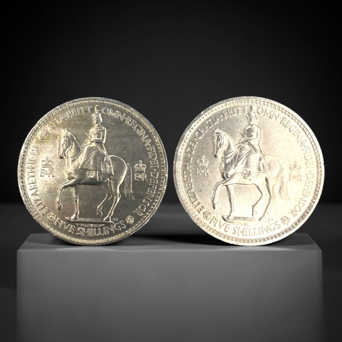 UNITED KINGDOM: Coronation & Commonwealth - 2-Piece Five Shillings Coins Set, 1953, 38mm, 23ZJ: This 2-piece set of 1953 Five Shillings (Crown) coins was issued to commemorate the coronation of Queen Elizabeth II, a pivotal moment in British and Commonwealth history. Each 38mm piece features the