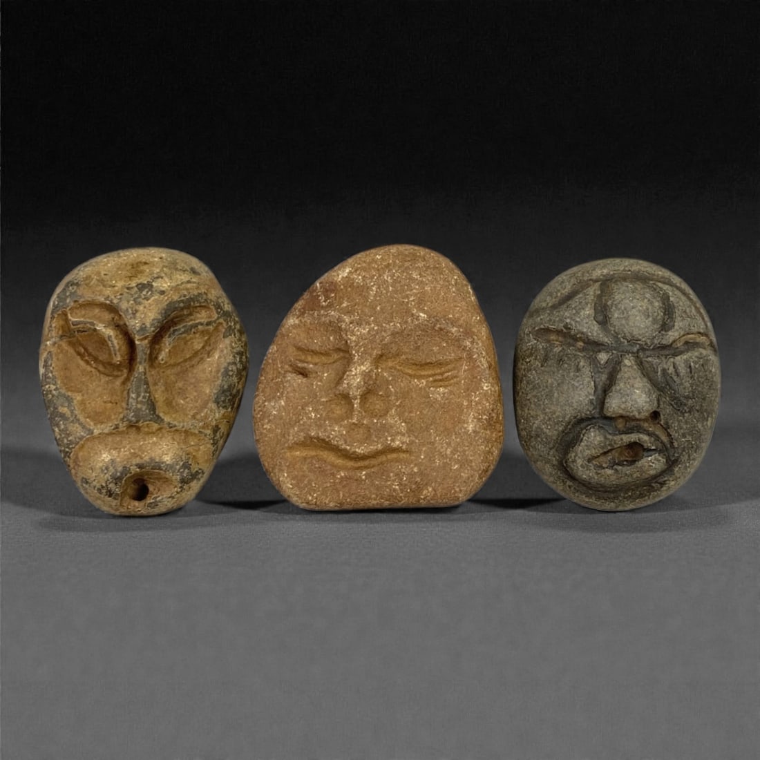 A Group of Three Medieval Stone Maskette Amulets, 10th-14th Century, 51FP (1 of 1)
