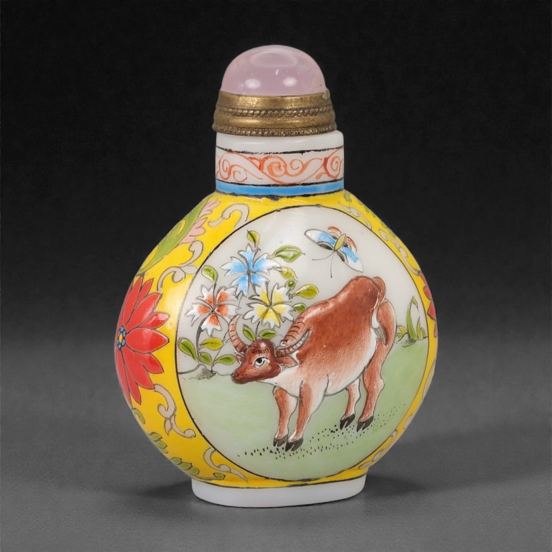 A Chinese Enameled Glass Snuff Bottle, 20th Century, 5FG: The bottle is formed from opaque white glass with a flattened ovoid body, a short cylindrical neck, and a slightly recessed oval foot. The exterior is decorated in polychrome enamels, with a bright ye