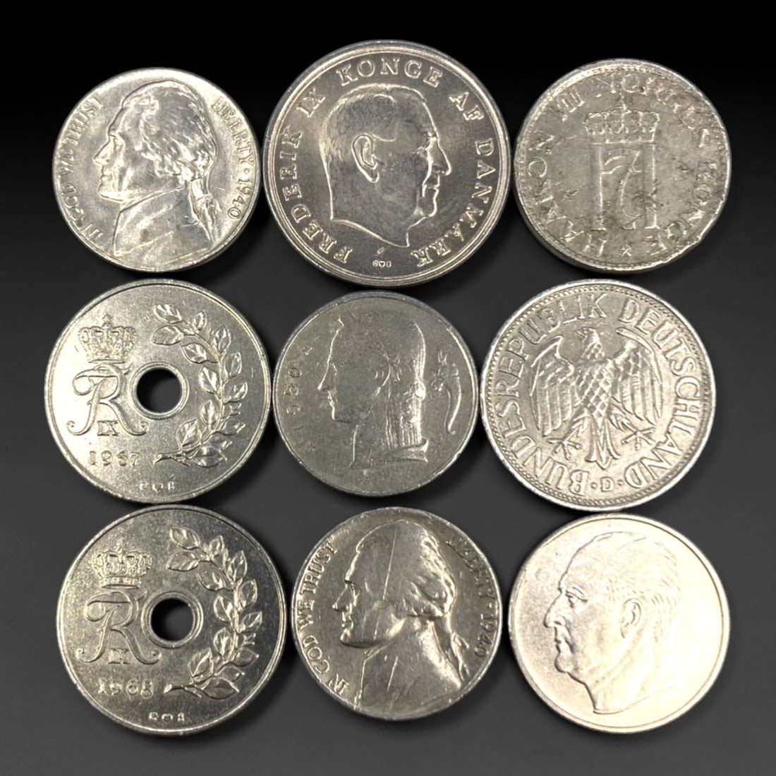 GLOBAL: Post-War Monetary Identity - 9-Piece Coins Set, 1957-1971, 20-25mm, 25ZJ: This curated 9-Piece Coins Set spans the post-war era, featuring coins from the United States, Denmark, Norway, and West Germany, ranging from 20 to 25mm in diameter. Each piece anchors to a pivotal m