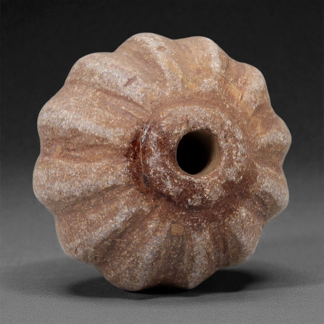 A Near Eastern Melon Stone Bead, 3rd-2nd Millennium BCE, 1FM (1 of 2)