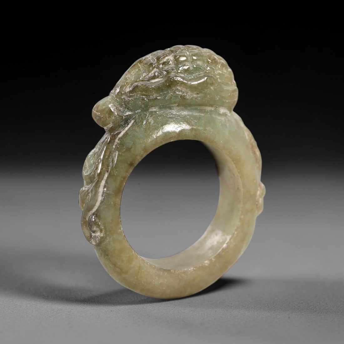 A Chinese Jadeite Jade Mythical Beast-Form Ring, Qing Dynasty, 71FS (1 of 1)
