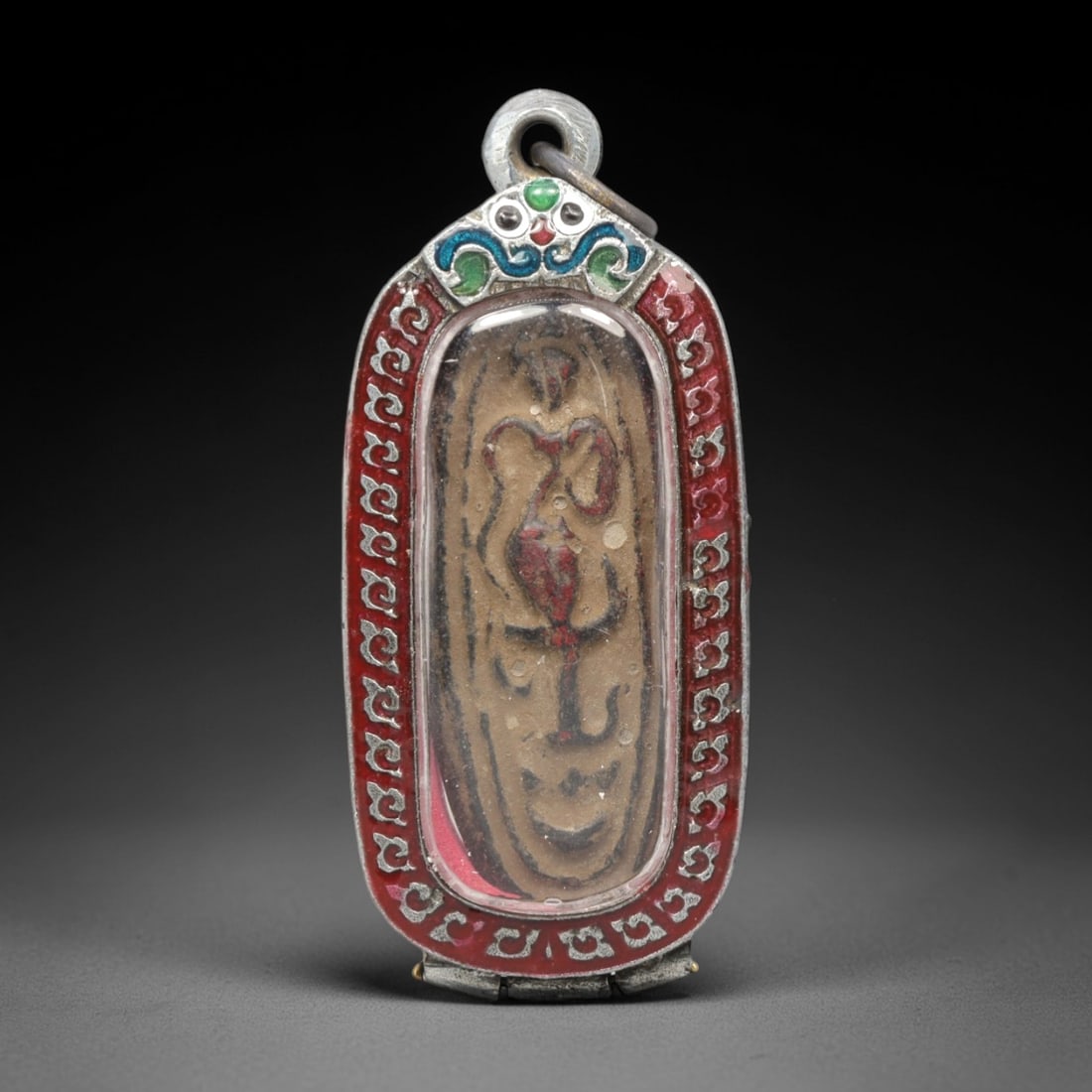 A Thai Palad Khik Amulet in an Enameled Silver-Tone Case, 20th Century, 16ZK (1 of 2)