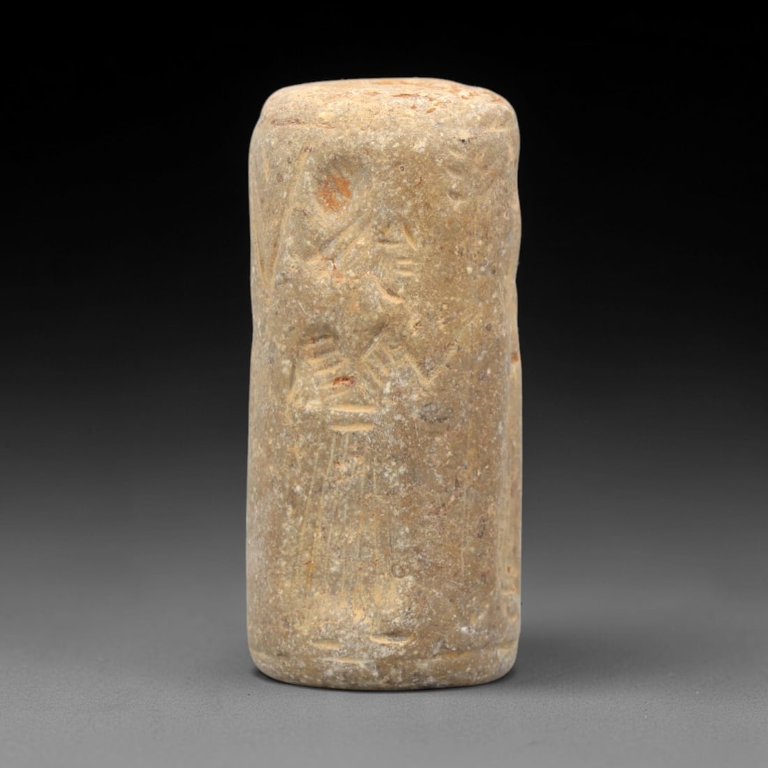 A Near Eastern Stone Cylinder Seal, 2nd-1st Millennium BCE, 33FT (1 of 2)