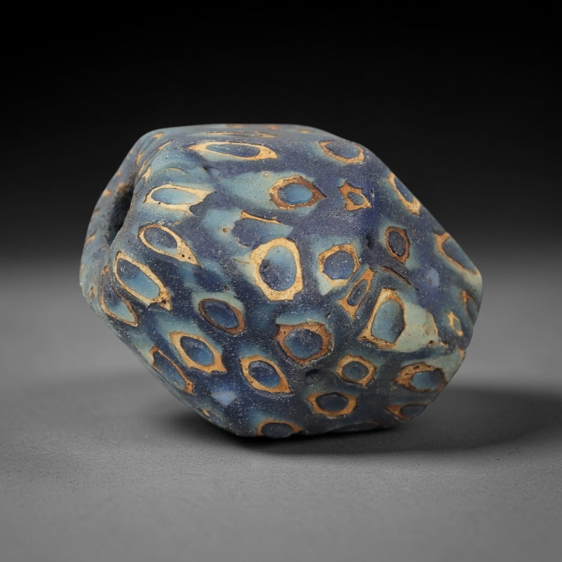 Monumental Ancient Glass Eye Bead - Egyptian Protective Amulet, 37ZM: This exceptional large-format bead is crafted from deep cobalt blue glass, employing the sophisticated core-formed and trailed techniques hallmarked by Egyptian glassworking mastery. Departing from th