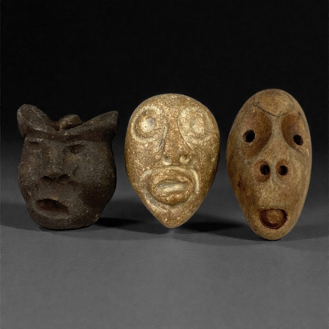 A Group of Three Medieval Stone Maskette Amulets, 10th-14th Century, 47FP (1 of 1)