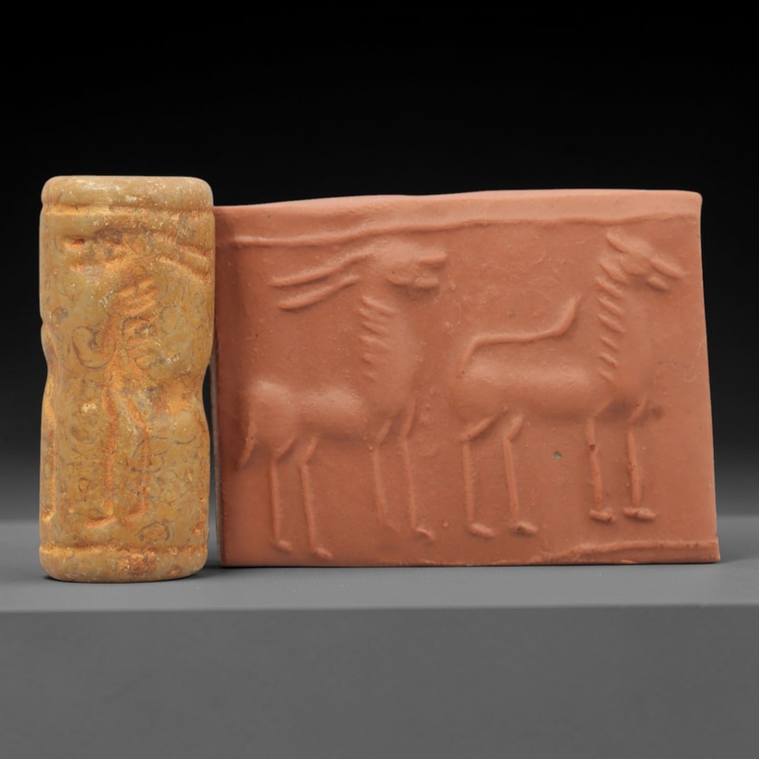 A Mesopotamian Stone Cylinder Seal, Circa 2nd Millennium BCE, 7FT (1 of 2)
