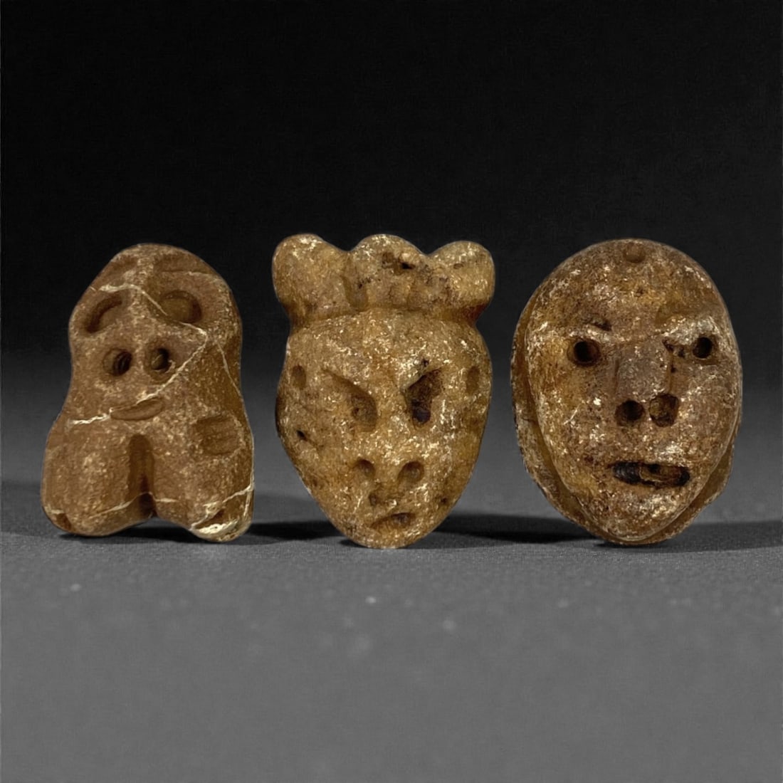 A Group of Three Medieval Stone Maskette Amulets, 10th-14th Century, 52FP (1 of 1)