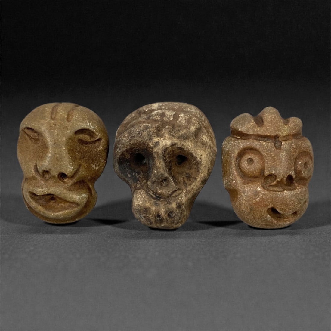 A Group of Three Medieval Stone Maskette Amulets, 10th-14th Century, 56FP (1 of 1)