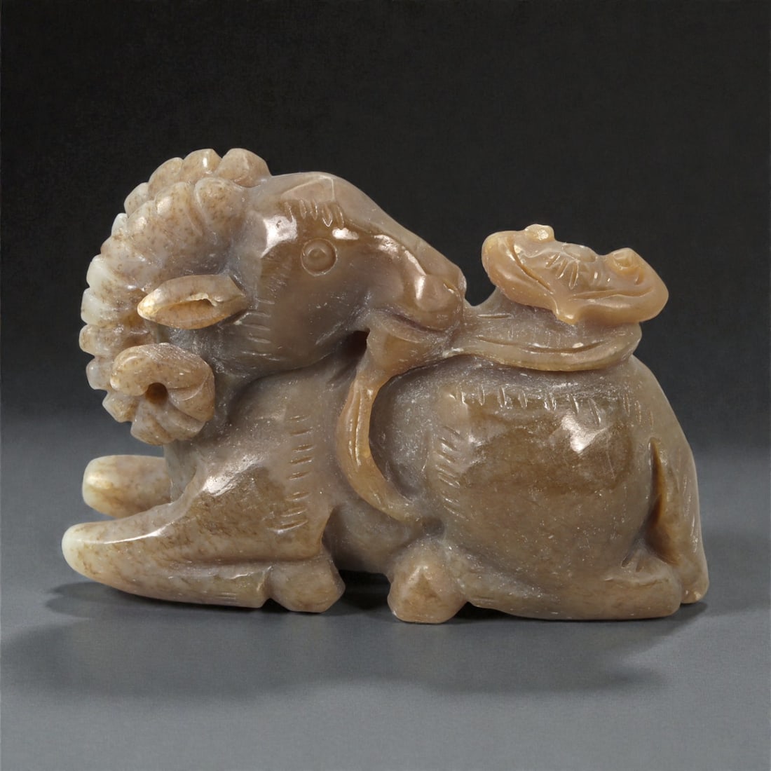 A Chinese Jade Carving of a Recumbent Ram with Lingzhi, 20th Century, 25YA (1 of 3)