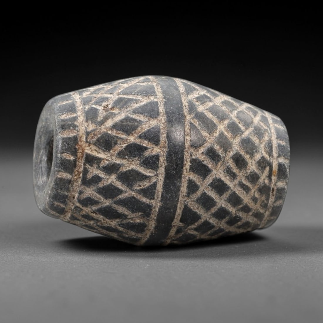 A Near Eastern Schist Cylindrical Bead, Circa 1st Millennium BCE, 12FT (1 of 2)