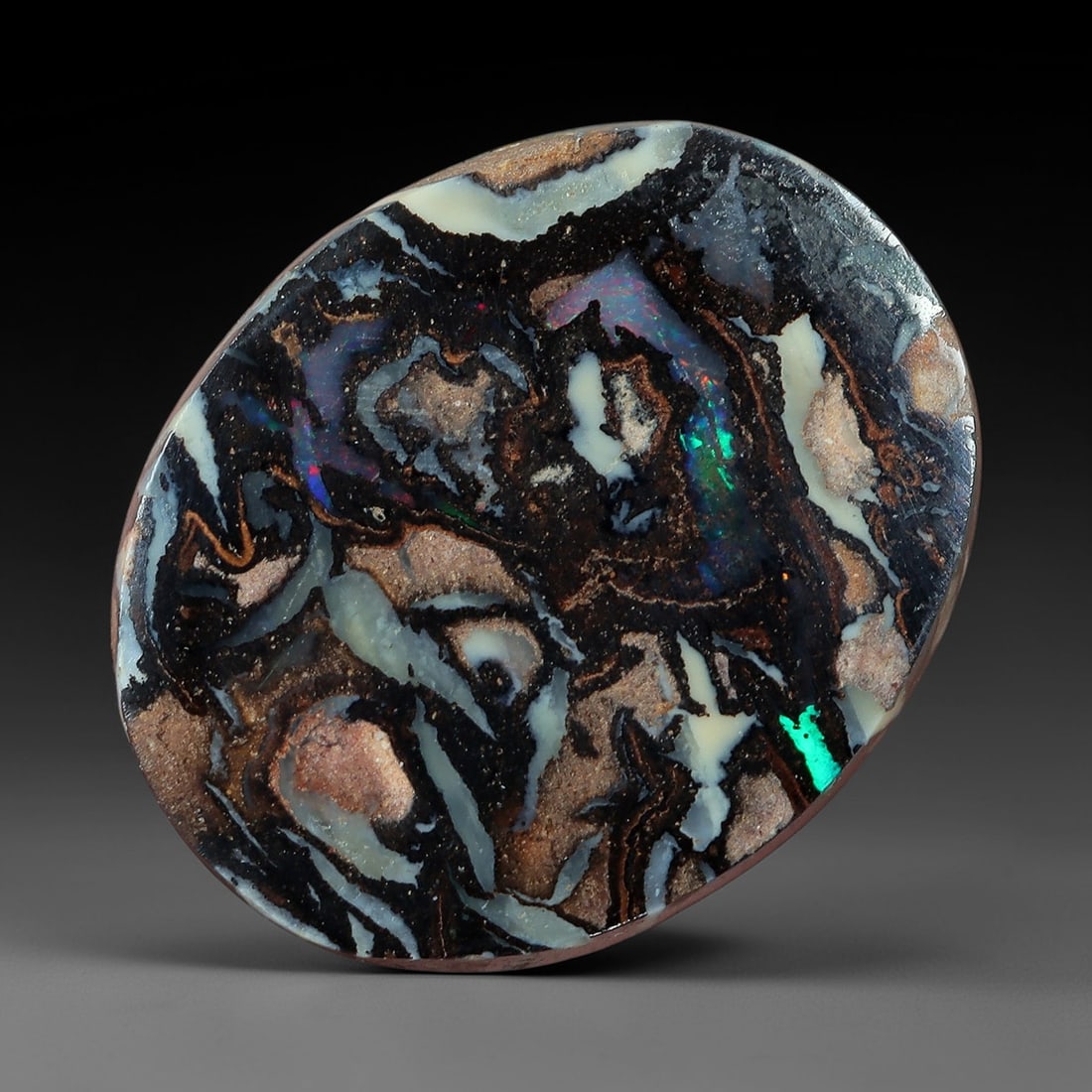 2.75 Carats Koroit Yowah Opal Cabochon - Natural Australian Single Stone, 70XL: This striking Koroit Yowah opal cabochon, measuring 10.2x8.4mm, features a dense, fragmented ironstone matrix in deep black and warm terracotta, interwoven with broad, milky-white opal veins. Concentr