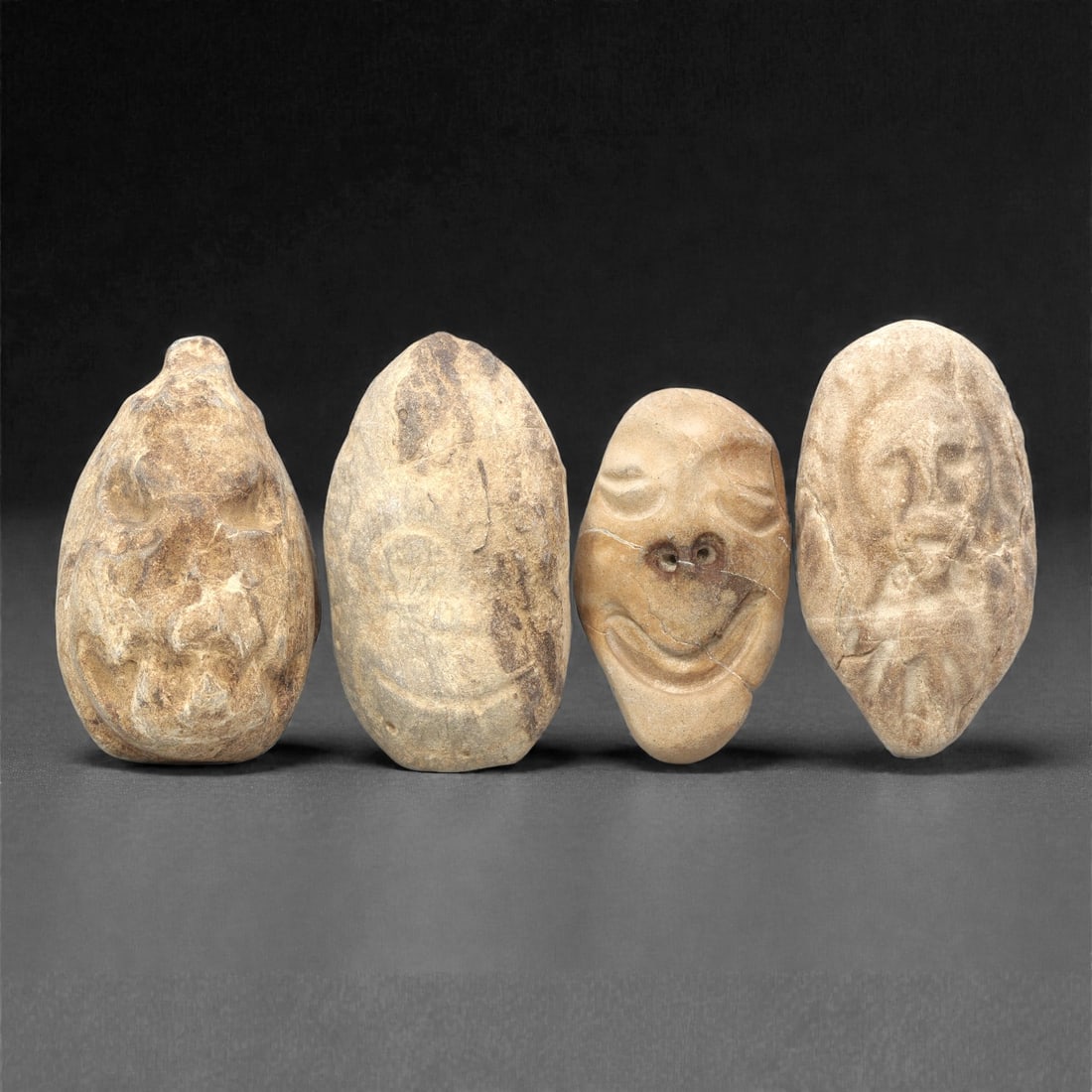 A Group of Four Ancient Near Eastern Stone Maskettes, 2nd-1st Millennium BCE, 3ZH (1 of 1)
