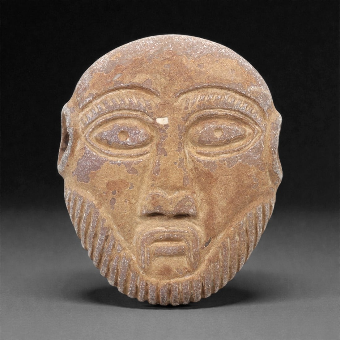 A Near Eastern Stone Maskette, 1st Millennium BCE, 29FL (1 of 2)