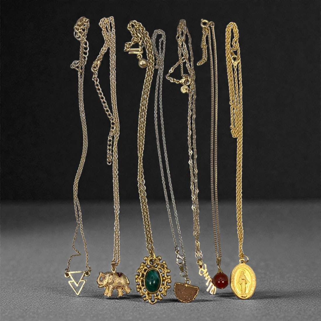 An Estate Lot of Seven Pendant Necklaces, Late 20th Century, 61FK (1 of 1)
