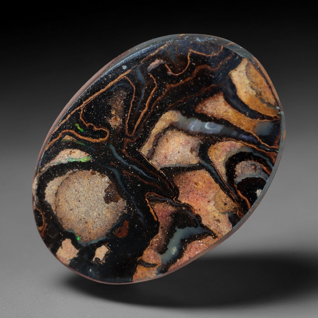 3.85 Carats Koroit Yowah Opal Cabochon - Natural Australian Single Stone, 75XL: This exceptional Koroit Yowah opal cabochon presents a dramatic, painterly pattern of natural ironstone matrix, with swirling bands of deep black, warm terracotta, and earthy tan framing vivid flashes