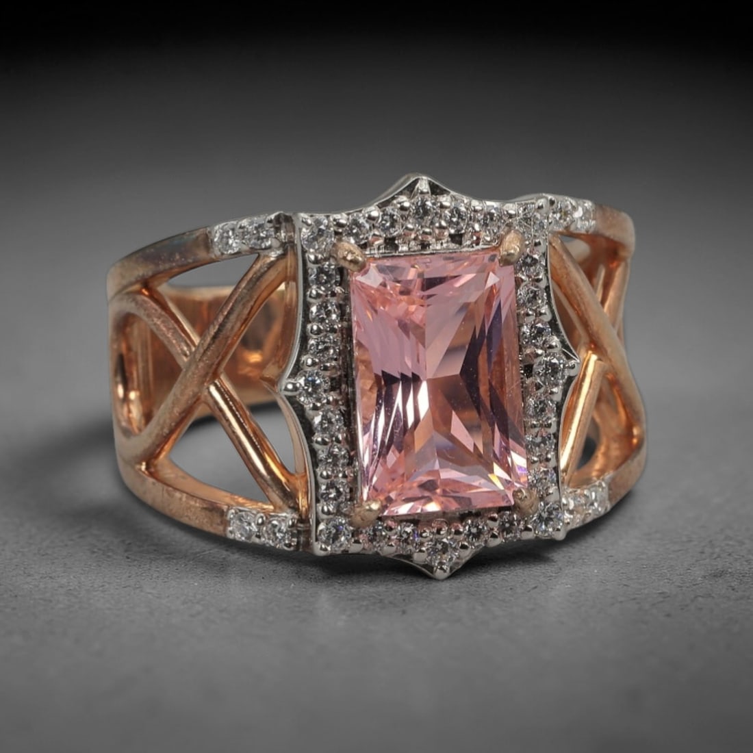 A Modern Silver and Chatham Diffusion Sapphire Ring, 20th Century, 87FT: Crafted from stamped 925 silver with a two-tone finish, the ring features a central rectangular step-cut Chatham diffusion sapphire of soft pink hue, secured by four prongs within a white gold-toned b