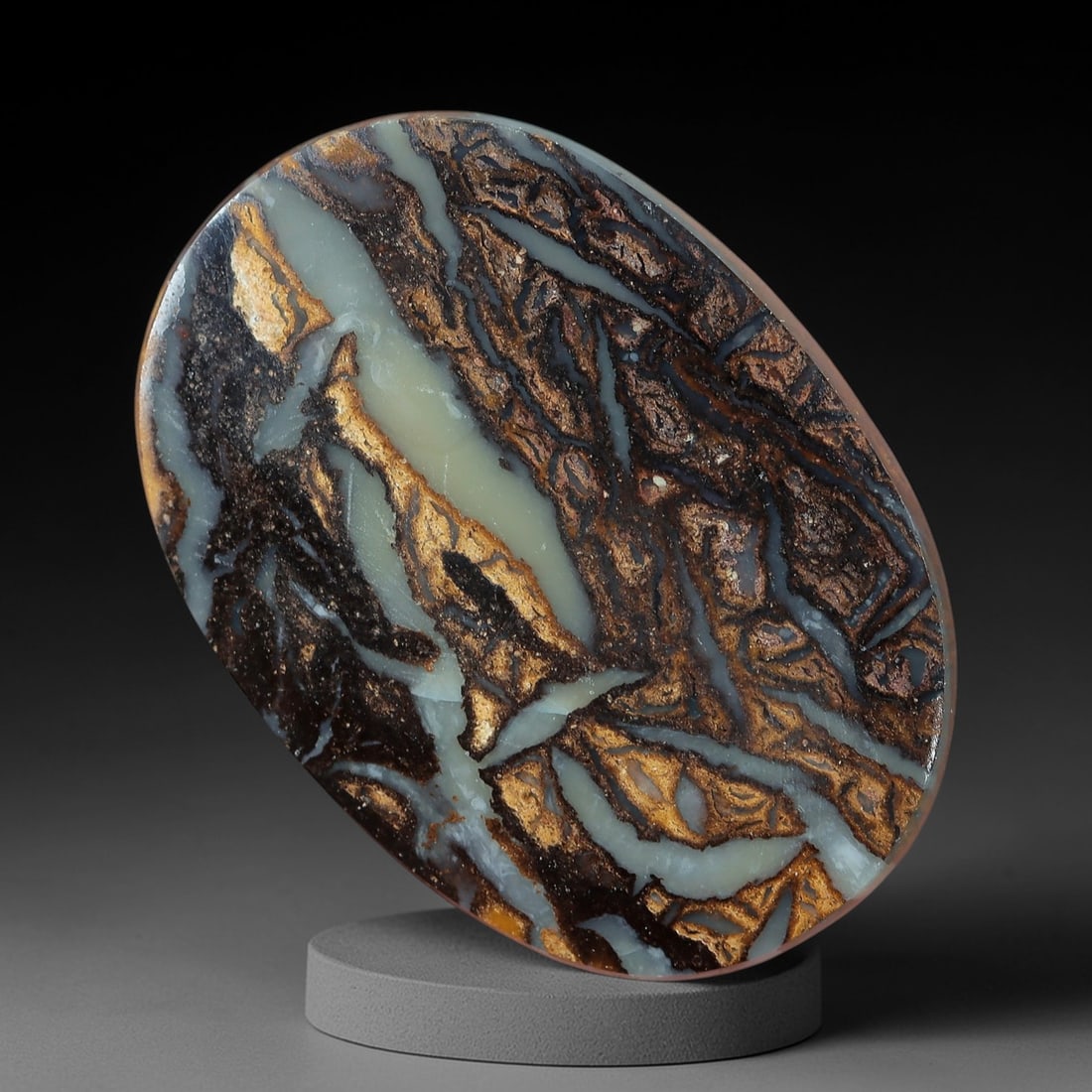 4.25 Carats Koroit Yowah Opal Cabochon - Natural Australian Single Stone, 83XL: This substantial Koroit Yowah opal cabochon, measuring 13.7x9.7mm, features a striking, vein-like ironstone matrix in deep black and metallic bronze, interwoven with broad, milky-white opal veins. The