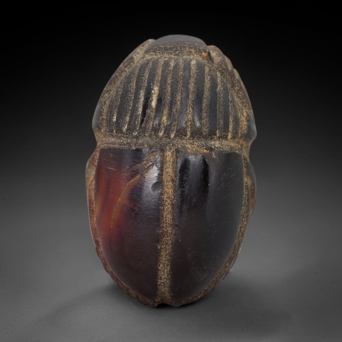 Ancient Agate Scarab - Egyptian Amulet Figurine, 4AE: Carved from banded agate of rich reddish-brown hue, this amulet takes the form of an Egyptian scarab, a symbol deeply associated with protection, rebirth, and divine authority in ancient Egyptian icon