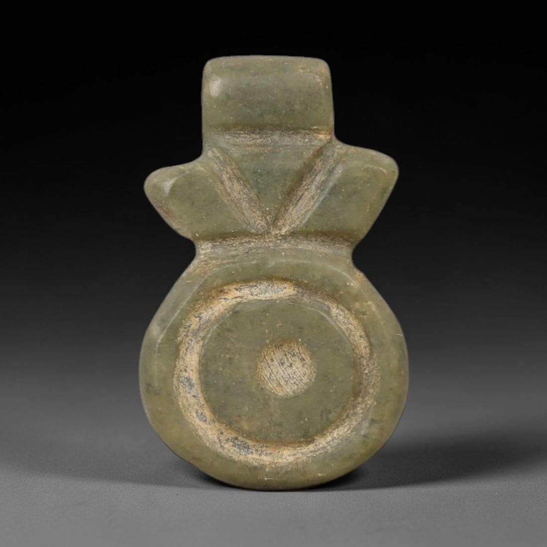 Ancient Stone Fly Amulet - Egyptian Ritual Figurine, 60AG: This amulet is carved from a single piece of mottled greenish-grey stone, exhibiting a fine-grained texture with subtle earthy patina and natural mineral veining across its surface. The form features