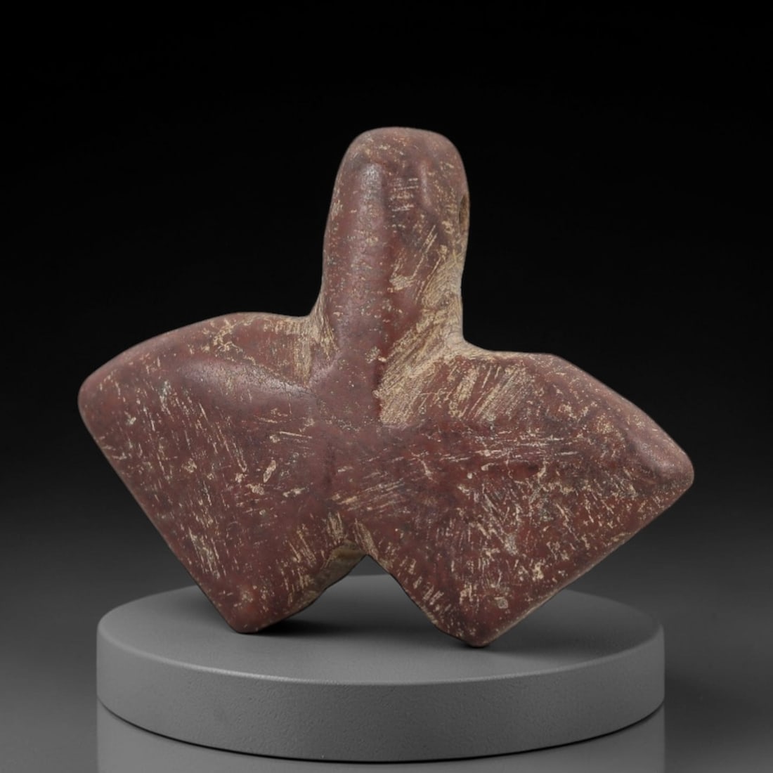 Ancient Egyptian Stone Amulet - Triangular Grid Carving, 92AE: Carved from stone, this ancient Egyptian amulet features a triangular form with incised grid detailing, typical of protective amulets from the Late Period (c. 664-332 BCE). The grid motif was associat