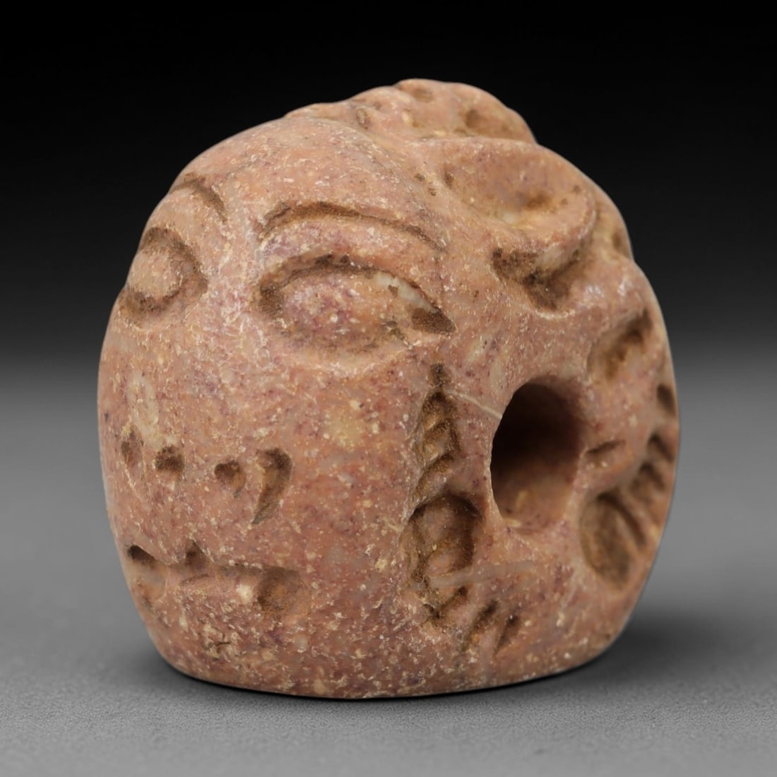 Ancient Steatite Hemispherical Stamp Seal - Humanoid Carving, 14AH: Carved from steatite stone, this ancient hemispherical stamp seal features a humanoid figure with incised detailing on its upper surface, typical of Near Eastern glyptic traditions. The stone exhibits