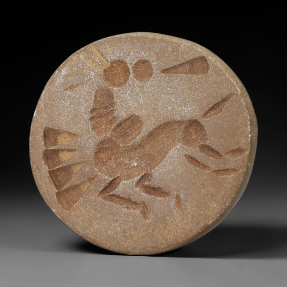 Ancient Stone Amulet - Near Eastern Stamp Seal Figurine, 24AH: Carved from stone, this ancient Near Eastern stamp seal amulet features a stylized human-animal motif typical of early glyptic art in the region. The piece exhibits precise linear detailing and a smoo