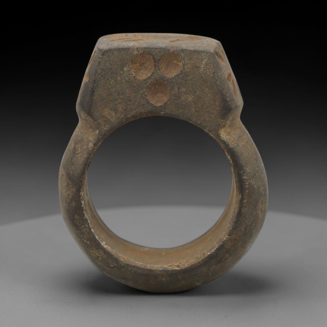 Ancient Steatite Intaglio Ring - Near Eastern Carved Signet Ring, 38ZQ: Carved from steatite, this ancient Near Eastern intaglio ring features a central intaglio panel with a stylized animal motif and linear detailing, typical of early glyptic art. The ring exhibits a smo