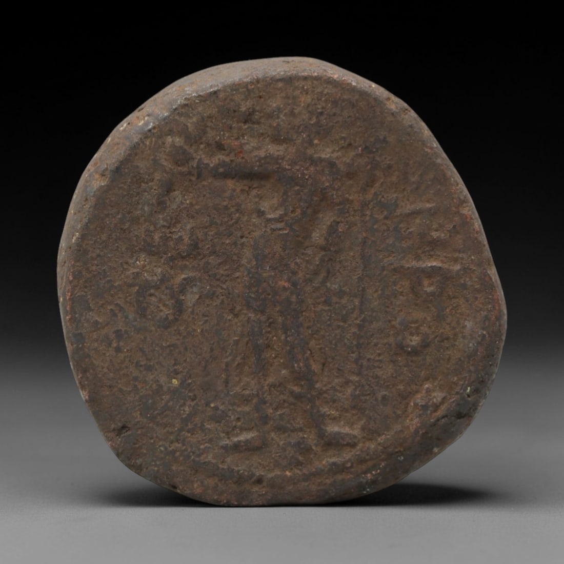KUSHAN EMPIRE: Royal Warrior - Bronze Coin, 2nd-3rd Century CE, 25mm, 16.2g, 100AJ: This substantial bronze coin from the Kushan Empire features a dynamic royal warrior motif, a defining symbol of imperial authority and martial prowess. The obverse displays a ruler in a combat-ready