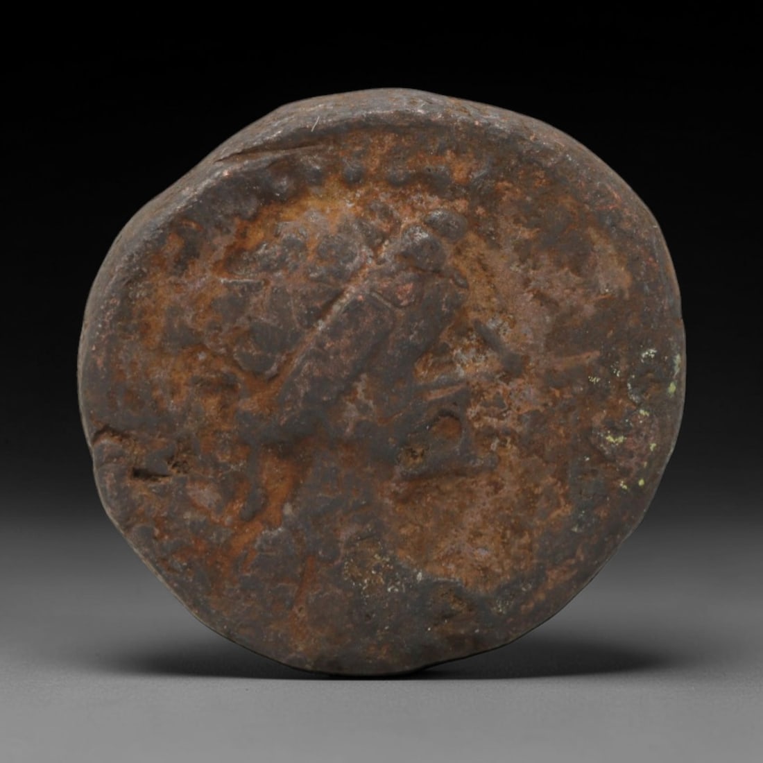 KUSHAN EMPIRE: Horse Rider - Bronze Coin, 20mm, 7.69g, 2AK: This bronze Kushan coin bears the iconic motif of a horse-mounted rider, a symbol of royal authority and military prowess in Central Asian numismatics. The obverse features a dynamic equestrian figure