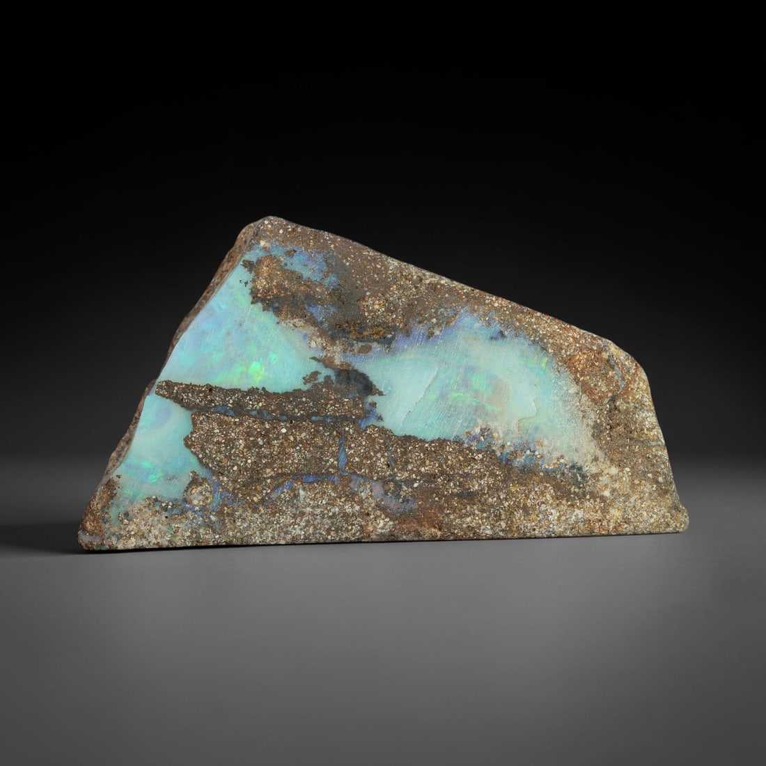 42.94 Carats Winton Boulder Opal Rough Slab - Natural Australian Opal, 41XP: This museum-grade Winton boulder opal rough slab presents a dramatic canvas of mesmerizing seafoam-green and sky-blue iridescence, embedded within its natural ironstone matrix. Measuring a substantial