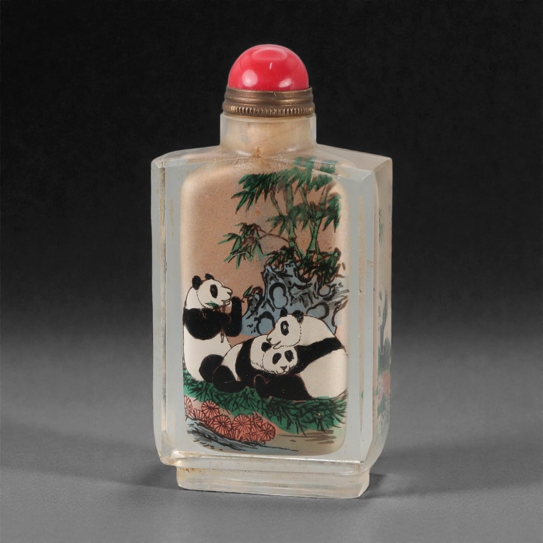A Chinese Crystal Glass Inside-Painted Snuff Bottle, 20th Century, 58FG: The snuff bottle is formed from clear crystal glass and of flattened rectangular section, rising from a narrow recessed foot to a short cylindrical neck with a flat rim. The interior is painted with a