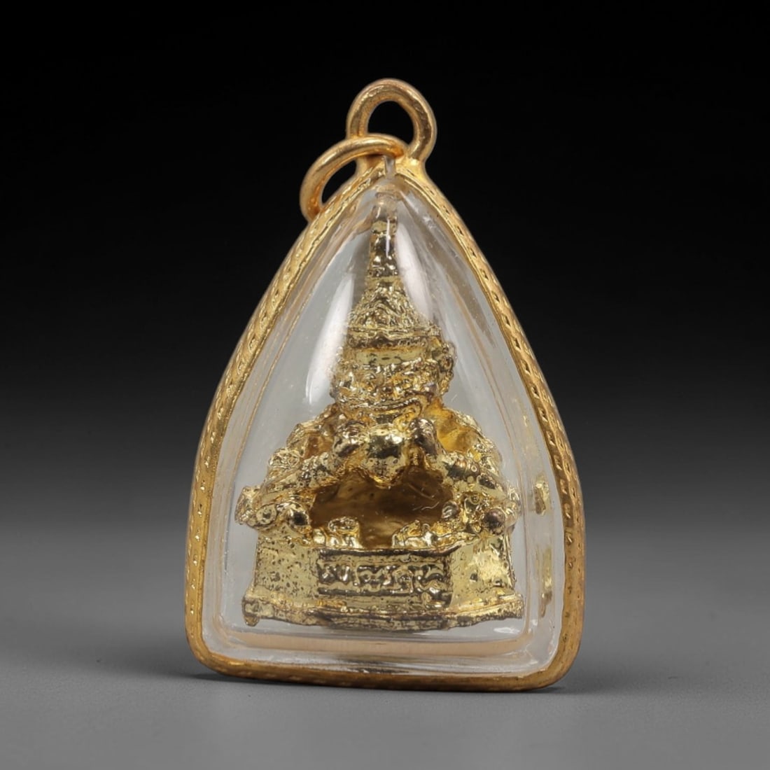 A Thai Gilt-Metal Rahu Amulet, 20th Century, 83FT (1 of 2)