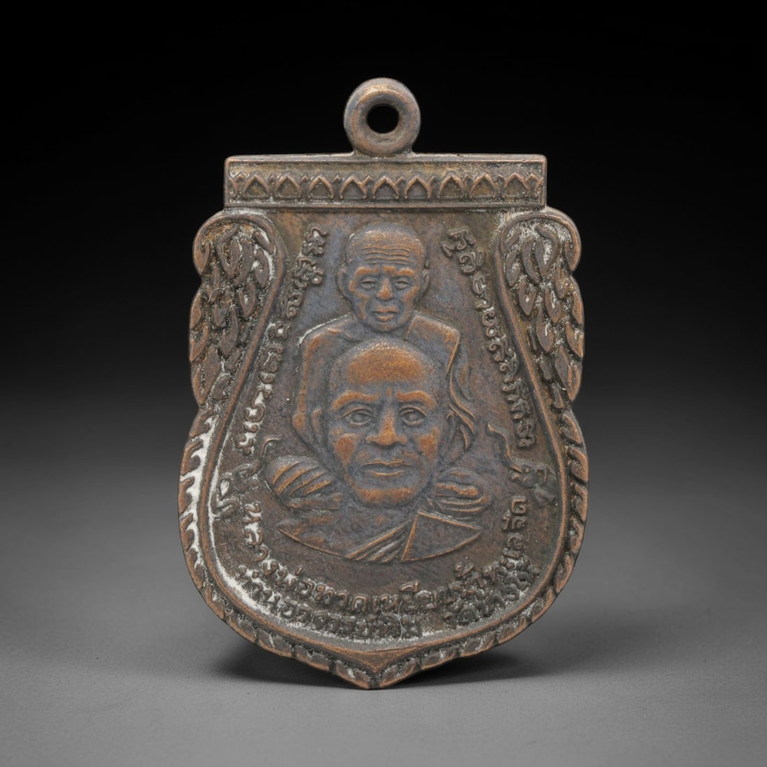 A Thai Copper Alloy Buddhist Amulet, Late 20th Century, 97FP (1 of 2)