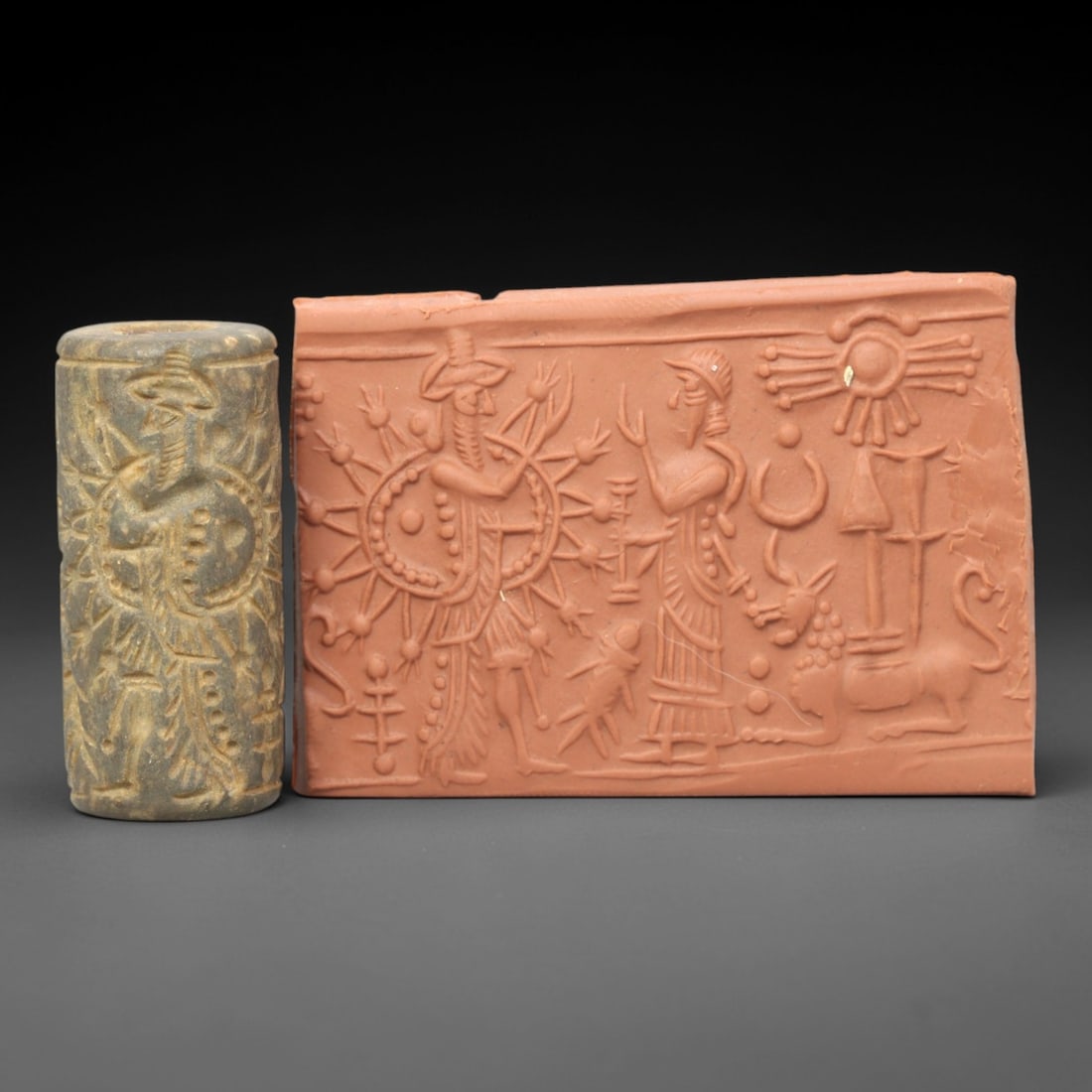 Ancient Steatite Cylinder Seal - Mesopotamian Sun Deity & Mythological Beast Scene, 10ZP: Carved from weathered, earthy steatite, this ancient Mesopotamian cylinder seal depicts a grand divine scene, executed with meticulous glyptic craftsmanship characteristic of the Neo-Assyrian or Achae