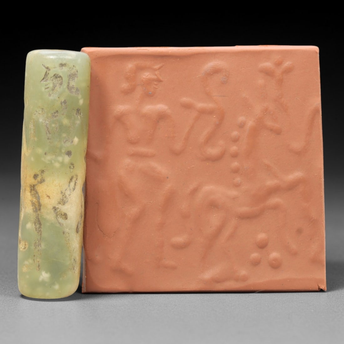 Ancient Serpentine Cylinder Seal - Mesopotamian, 48ZT: Carved from serpentine, this cylinder seal follows the classic cylindrical form of ancient Mesopotamian administrative and ritual artifacts. Attributed to the Bronze Age Mesopotamian cultures, this se