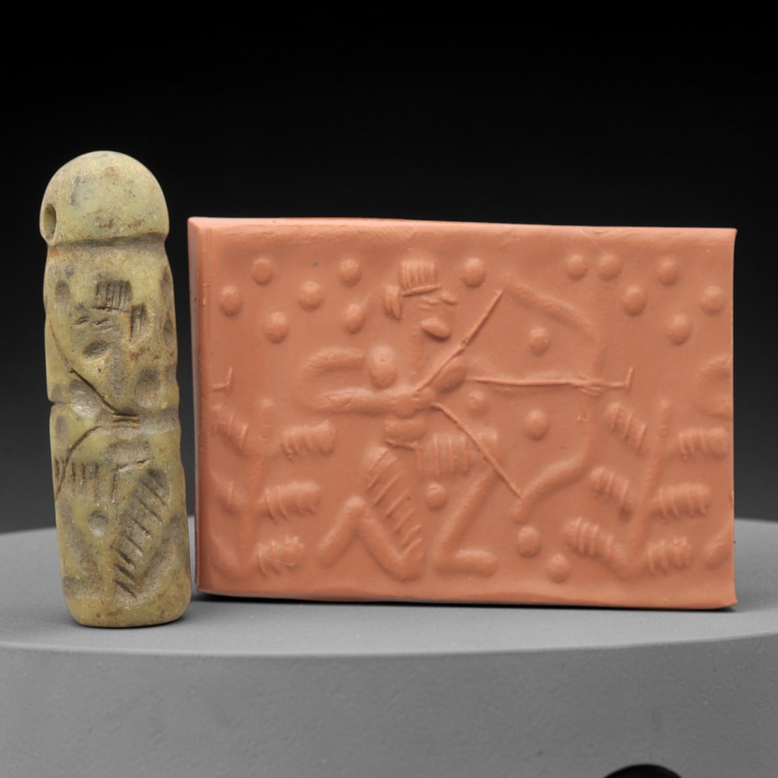 Ancient Serpentine Cylinder Seal - Mesopotamian, 55ZT: Carved from serpentine, this cylinder seal follows the classic cylindrical form of ancient Mesopotamian administrative and ritual artifacts. Attributed to the Bronze Age Mesopotamian cultures, this se