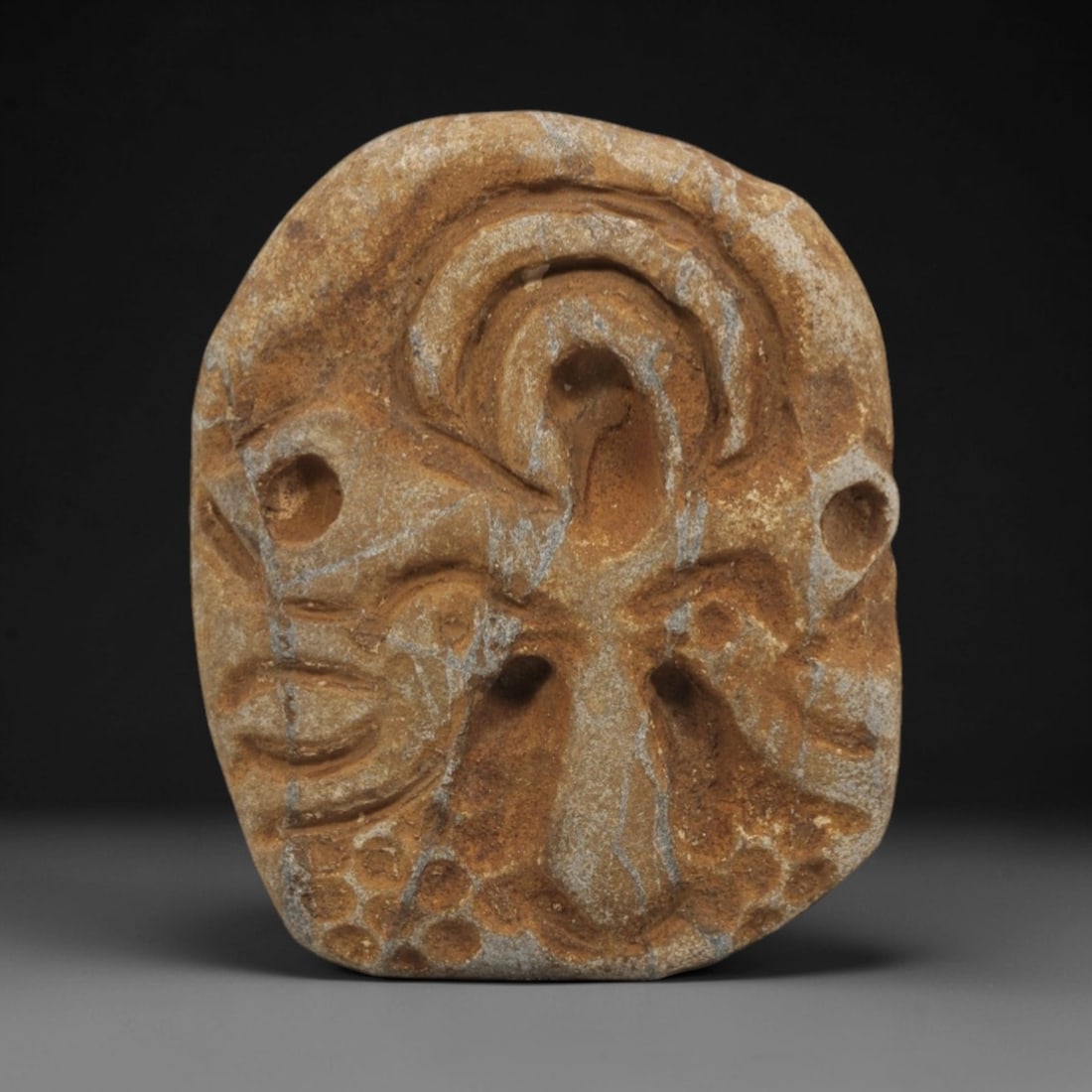 Ancient Stone Christian Cross Plaque - Religious Artifact, 10FX: Carved from a light-colored, granular stone with an earthy-brown patina and natural calcite veining, this artifact features a central Christian cross motif rendered in raised relief, flanked by recess