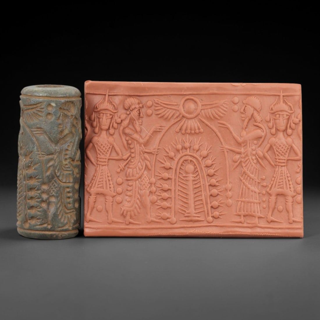 Ancient Steatite Cylinder Seal - Mesopotamian Divine Scene, 29ZP: Carved from weathered steatite, this ancient Mesopotamian cylinder seal presents a complex divine scene, executed with precise glyptic craftsmanship characteristic of Mesopotamian Bronze Age art. The