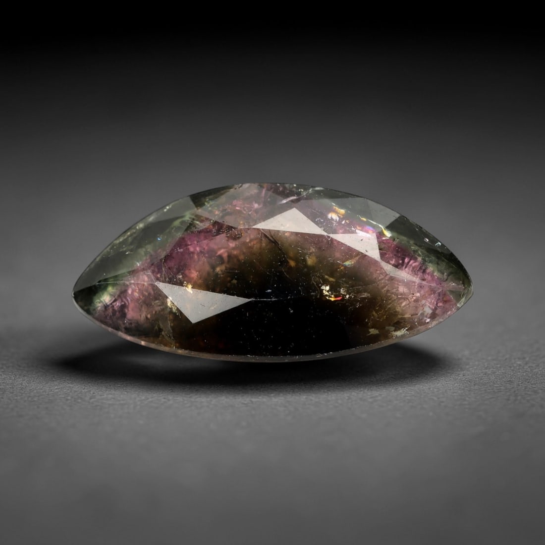 5.81 Carats Watermelon Bi-Color Tourmaline Marquise - Natural Nigerian Stone, 31XP: This striking marquise-cut tourmaline showcases a dramatic watermelon bi-color pattern, with deep magenta-pink at its core blending seamlessly into vibrant forest green along the edges. Measuring at 1