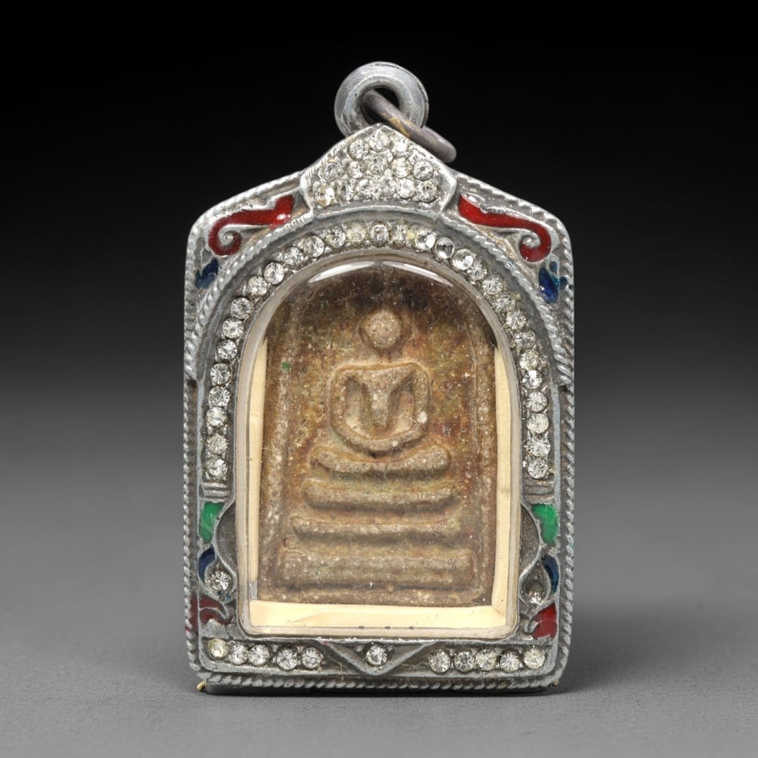 A Thai Phra Somdet Clay Amulet in a Gem-Set Silver-Tone Case, 20th Century, 25ZK (1 of 2)
