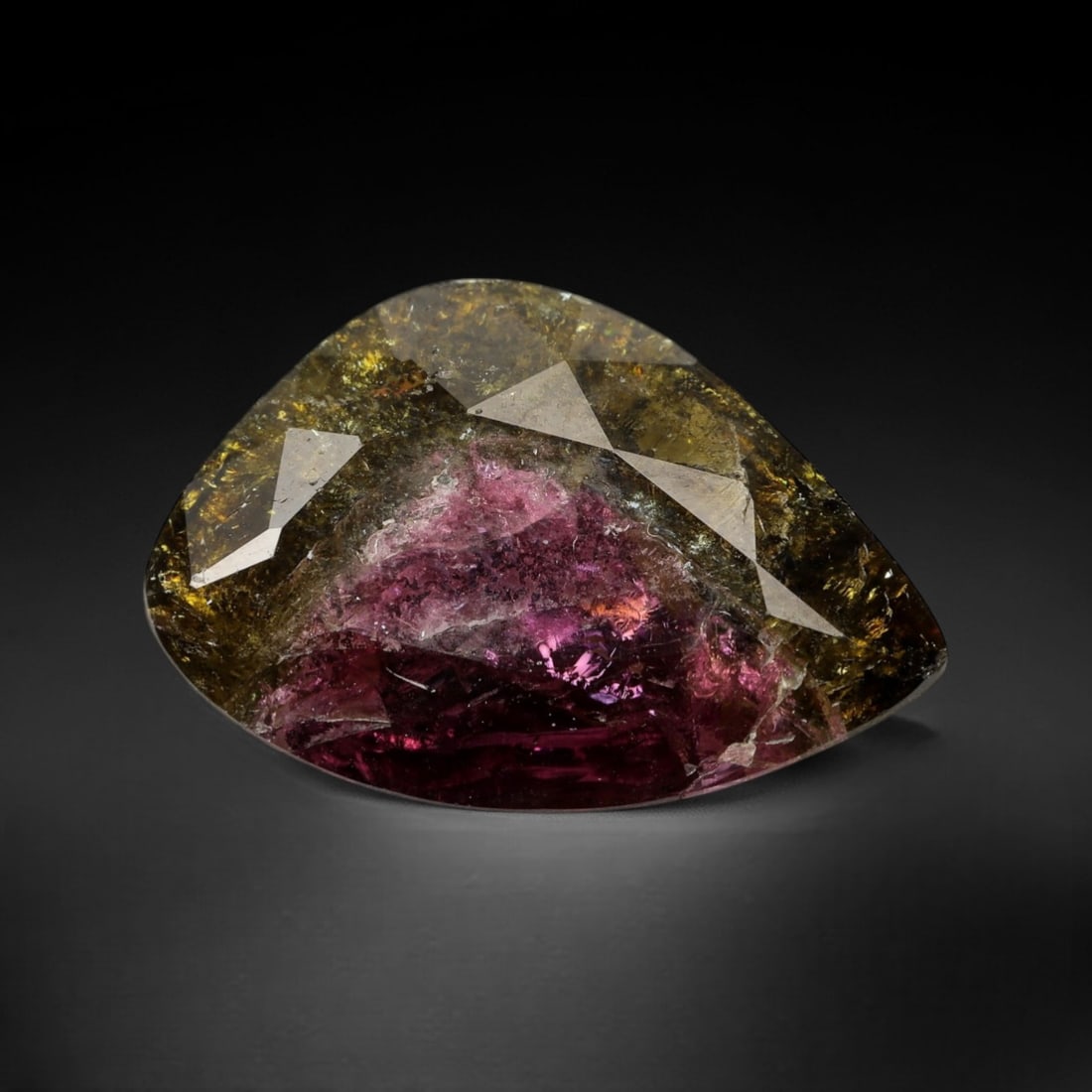 7.40 Carats Watermelon Bi-Color Tourmaline Fancy - Natural Nigerian Stone, 33XP: This magnificent fancy-cut tourmaline commands attention with its striking watermelon bi-color pattern, featuring a rich raspberry-pink core that gradients into deep olive-green at its edges. Measurin
