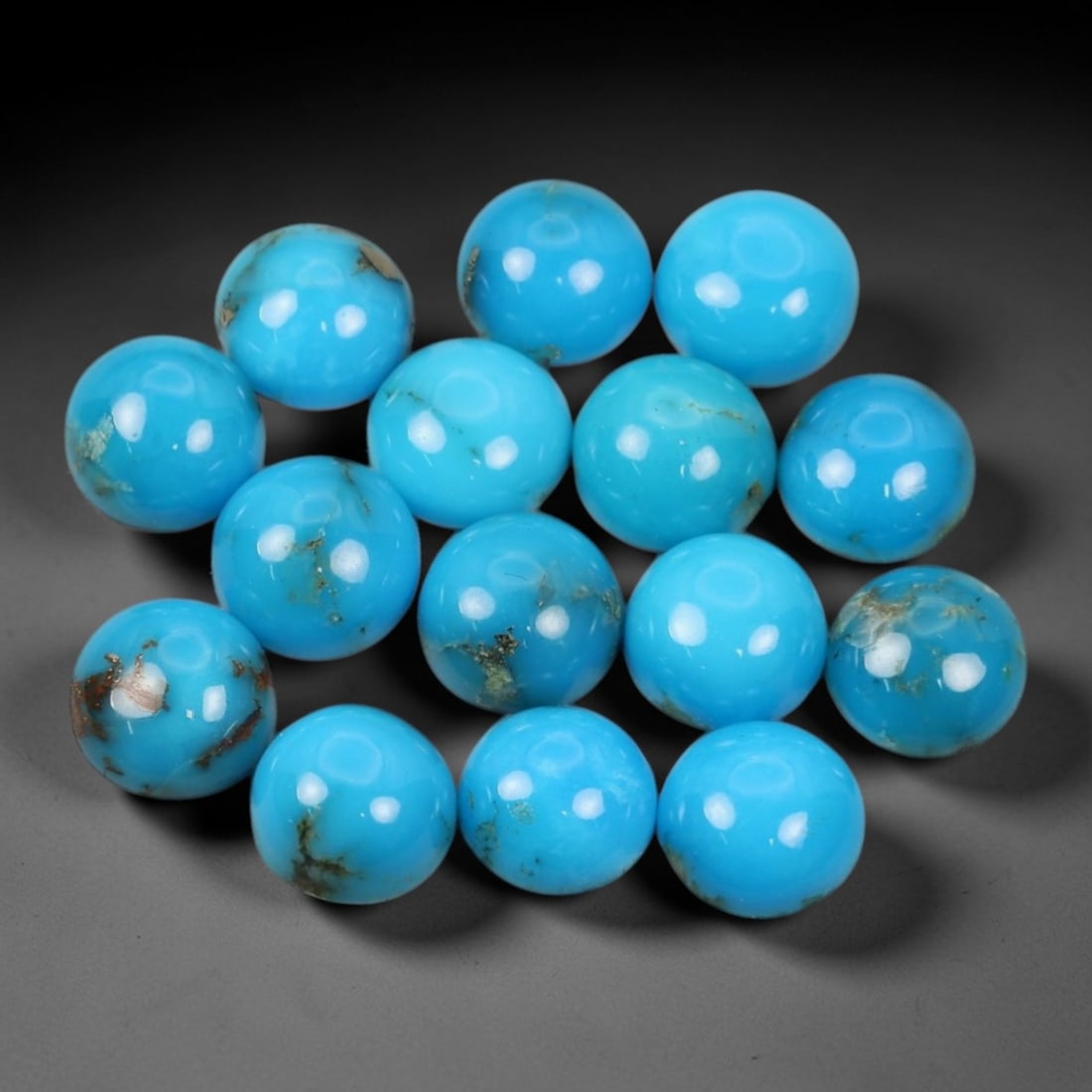 11.48 Carats Sky Blue Arizona Turquoise Cabochon Parcel - Natural Loose Gemstones, 15XP: This curated parcel of Arizona turquoise cabochons bursts with a vivid sky blue hue, saturated and luminous with a smooth, domed finish that enhances the stone's natural luster. Each cabochon, measuri