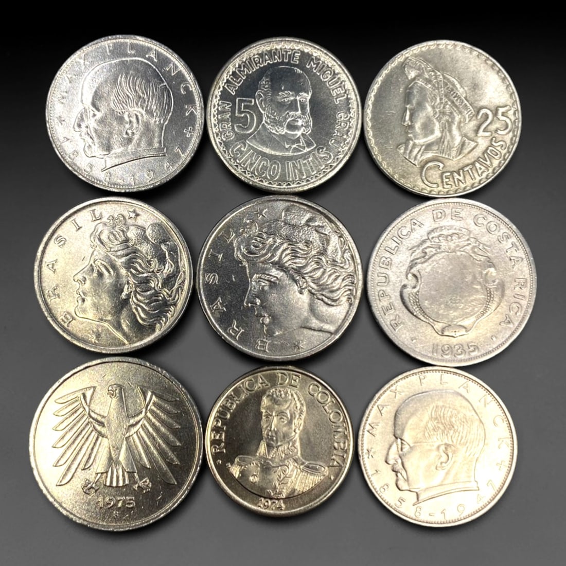 GLOBAL: Post-War Identity & Monetary Reform - 9-Piece Coins Set, 1935-1975, 25-29mm, 57ZJ: This curated 9-Piece Coins Set spans three decades of global numismatic history, featuring coins from Germany, Brazil, Costa Rica, Colombia, Guatemala, and Peru. Ranging from 25 to 29mm in diameter, e