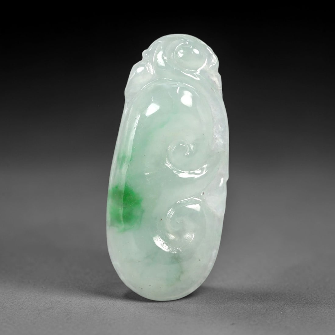 A Chinese Icy Jadeite Jade Ruyi Pendant, 20th Century, 58AB (1 of 2)