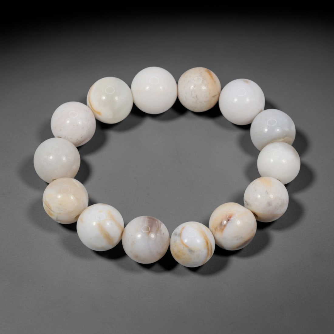 A Chinese Fossilised Wood Bead Bracelet, 20th Century, 81FS (1 of 1)