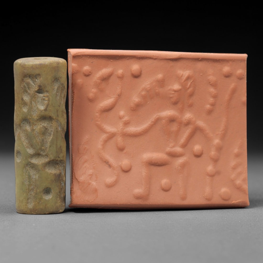 Ancient Serpentine Cylinder Seal - Mesopotamian, 60ZT: Carved from serpentine, this cylinder seal follows the classic cylindrical form of ancient Mesopotamian administrative and ritual artifacts. Attributed to the Bronze Age Mesopotamian cultures, this se